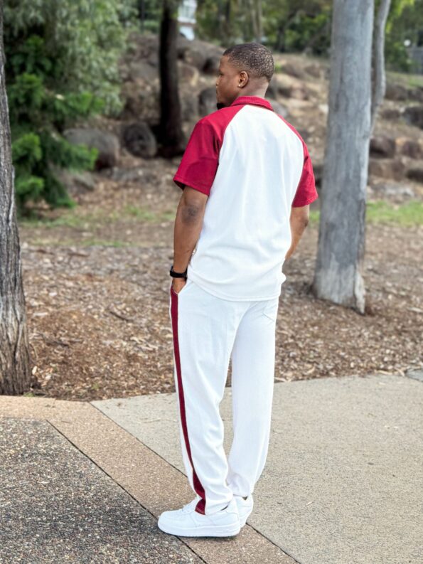 white tracksuit with red